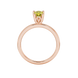 Pear shape canary yellow gemstone ring, rose gold lotus basket setting.
