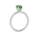 Pear shape emerald green gemstone ring, white gold lotus basket setting.