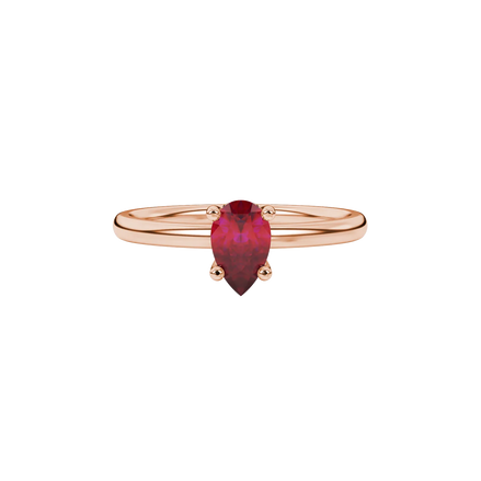 Close-up, pear shape raspberry red gemstone ring, rose gold lotus basket.