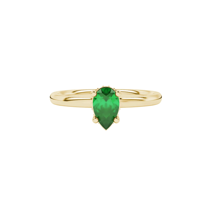 Close-up, pear shape emerald green gemstone, yellow gold pavé basket ring.