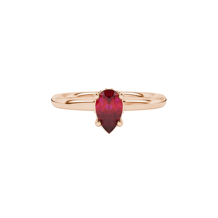 Close-up, pear shape raspberry red gemstone ring, rose gold pavé basket