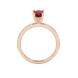 Pear shape raspberry red gemstone ring, rose gold pavé basket setting.