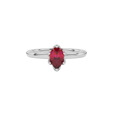 Close-up raspberry red gemstone ring, white gold scalloped setting.