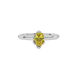 Close-up canary yellow gemstone ring, white gold scalloped setting.