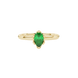 Close-up, pear shape emerald green gemstone, yellow gold scalloped ring.