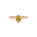 Close-up, pear shape canary yellow gemstone ring, rose gold scalloped setting.
