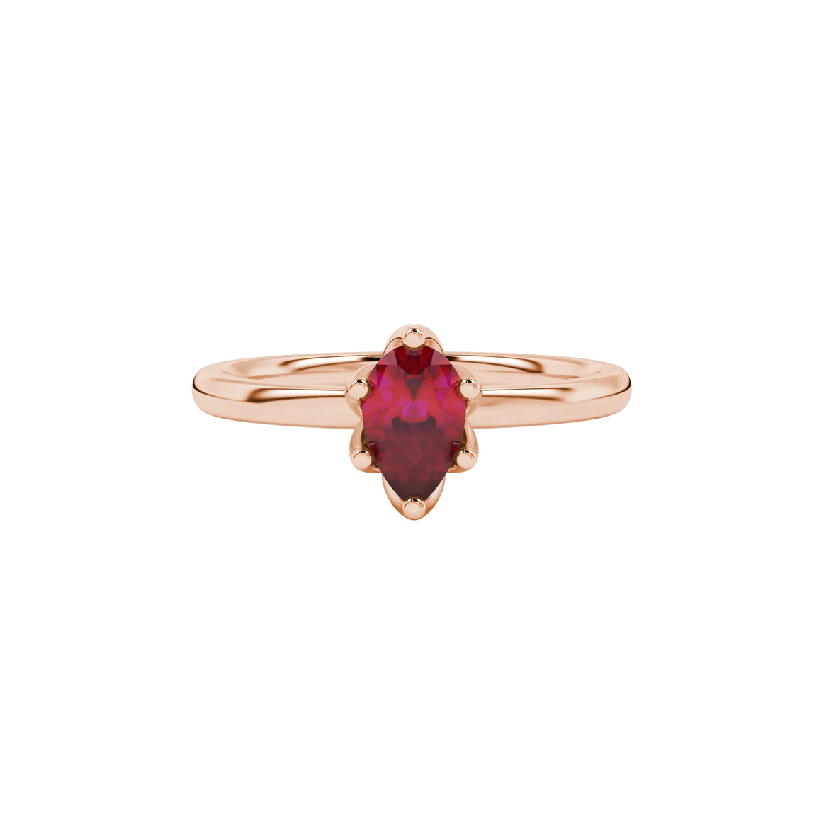 Close-up, pear shape raspberry red gemstone ring, rose gold scalloped setting.