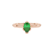 Close-up, pear shape emerald green gemstone ring, rose gold scalloped setting.