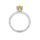 Pear shape canary yellow gemstone ring, white gold scalloped six-prong setting.
