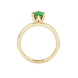 Pear shape emerald green gemstone ring, yellow gold scalloped six-prong setting.