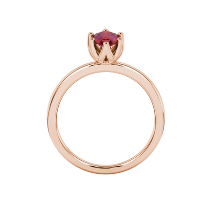 Pear shape raspberry red gemstone ring, rose gold scalloped six-prong setting.
