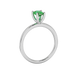 Side profile, white gold emerald green ring, surprise diamond gallery.