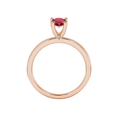 Pear shape raspberry red gemstone ring, rose gold surprise diamond setting.