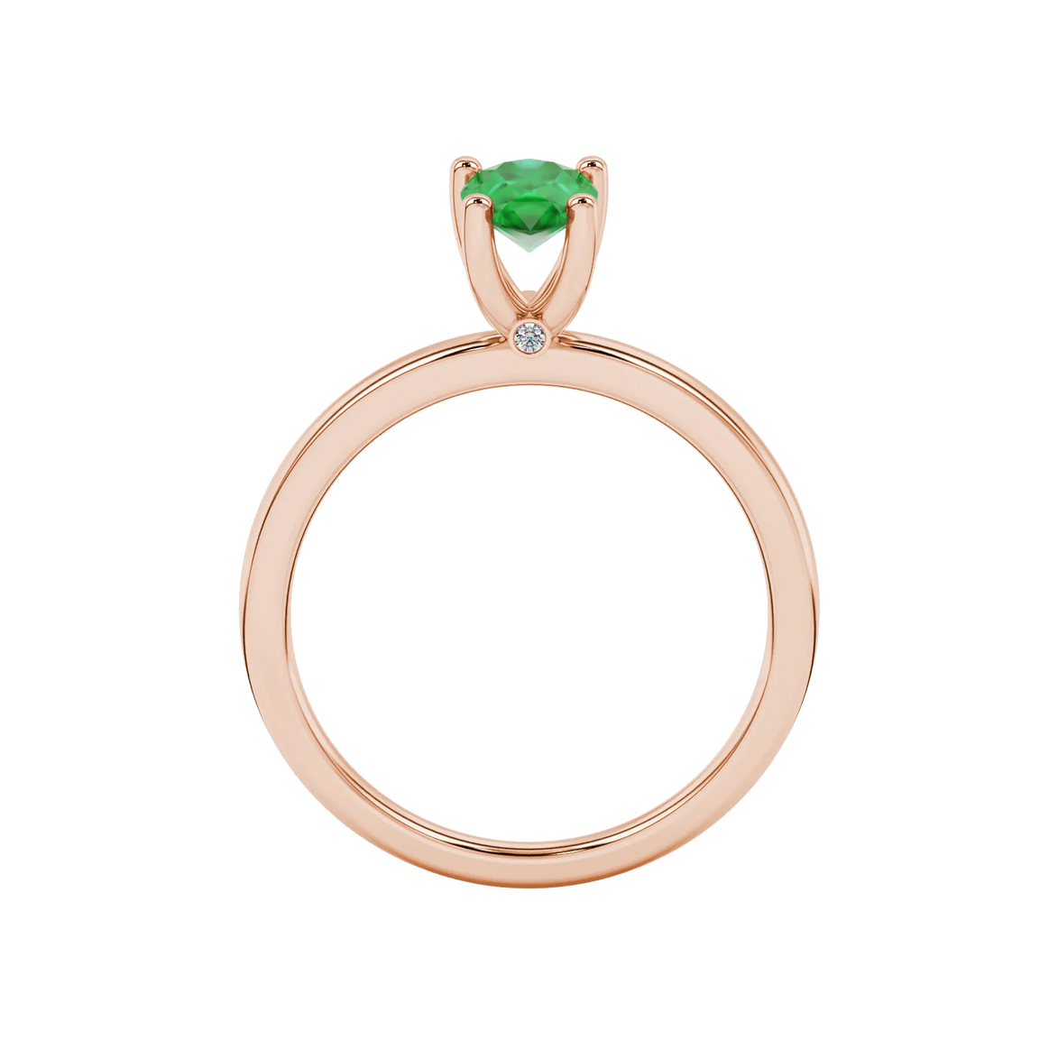 Pear shape emerald green gemstone ring, rose gold surprise diamond setting