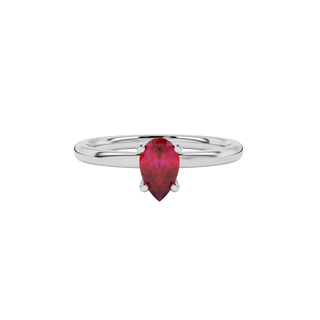 Close-up raspberry red gemstone pendant, white gold surprise diamond setting