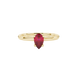 Close-up, pear shape raspberry red gemstone, yellow gold surprise diamond ring.