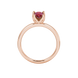 Pear shape raspberry red gemstone ring, rose gold tulip basket setting.