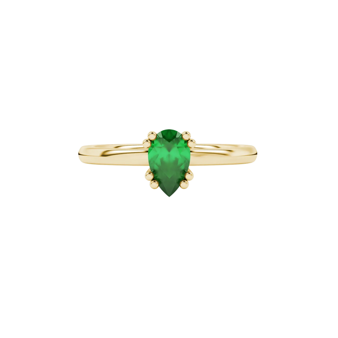 Close-up, pear shape emerald green gemstone, yellow gold vintage basket ring.