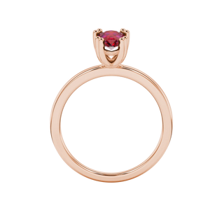 Pear shape raspberry red gemstone ring, rose gold vintage basket setting.