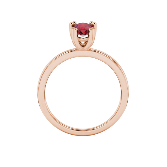 Pear shape raspberry red gemstone ring, rose gold vintage basket setting.