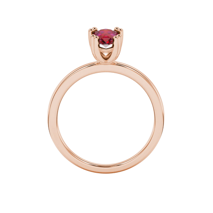 Pear shape raspberry red gemstone ring, rose gold vintage basket setting.