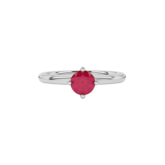 Close-up details of a round raspberry red gemstone secured in a white gold classic basket setting.