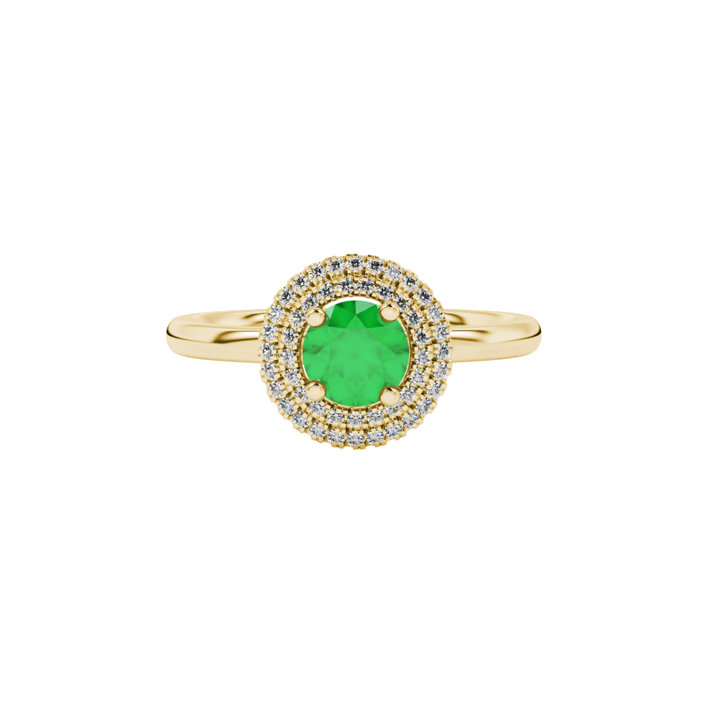 Close-up details of a round-cut emerald green gemstone in a yellow gold diamond falling edge halo.