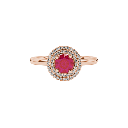 close-up shot of a round raspberry red gemstone ring with a diamond falling edge halo in rose gold.