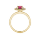 Round-cut raspberry red gemstone solitaire ring in a yellow gold falling edge halo diamond setting.