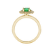 Round-cut emerald green gemstone solitaire ring in a yellow gold falling edge halo diamond setting.