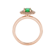 Round-cut emerald green gemstone solitaire ring in a rose gold falling edge halo diamond setting.