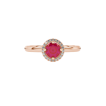 close-up shot of a round raspberry red gemstone ring with a diamond French pavé halo in rose gold.
