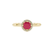 close-up of a round-cut raspberry red gemstone surrounded by a yellow gold diamond French pavé halo.
