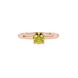 close-up of a round canary yellow gemstone ring with an intricate rose gold surprise diamond setting.