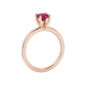 Side profile of a rose gold raspberry red gemstone ring showcasing the hidden surprise diamond detail.