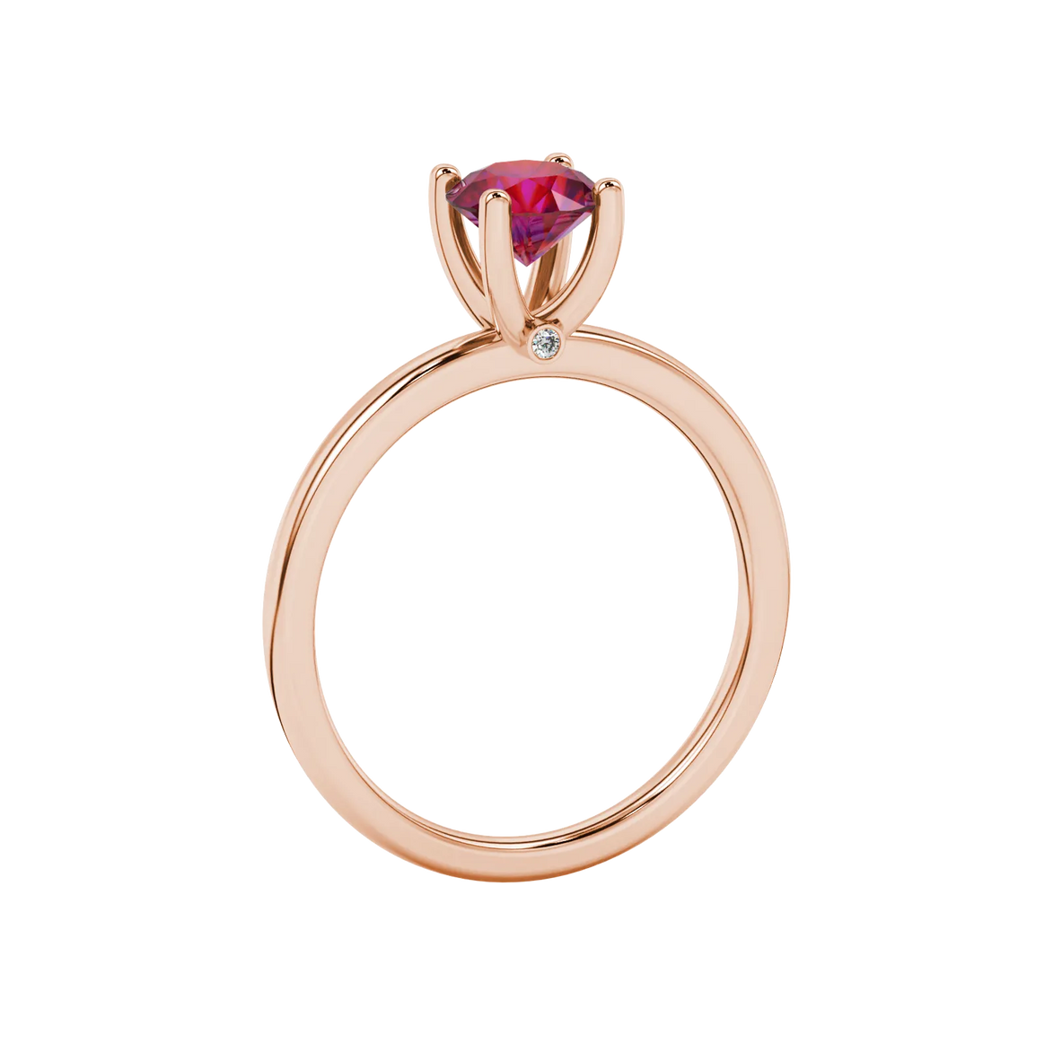 Side profile of a rose gold raspberry red gemstone ring showcasing the hidden surprise diamond detail.