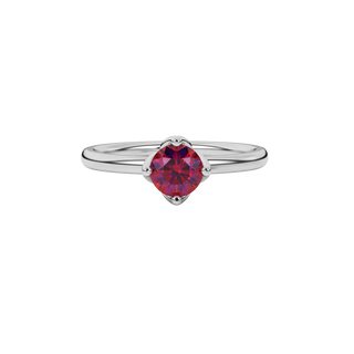 Close-up details of a round raspberry red gemstone secured in a white gold tulip basket setting.