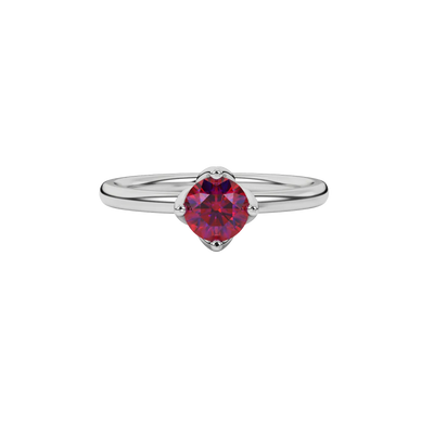 Close-up details of a round raspberry red gemstone secured in a white gold tulip basket setting.