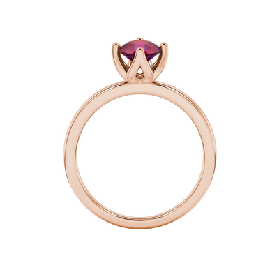 Round-cut raspberry red gemstone solitaire ring in a rose gold tulip basket setting