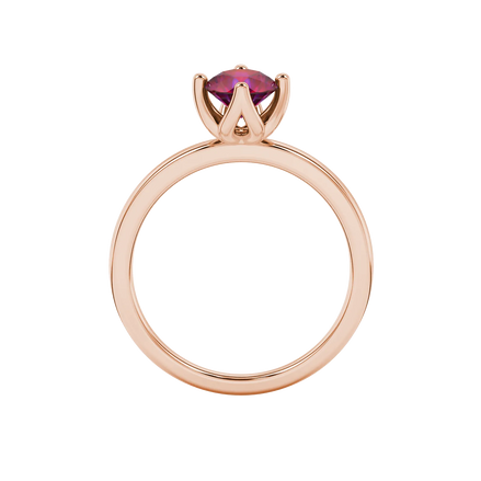 Round-cut raspberry red gemstone solitaire ring in a rose gold tulip basket setting