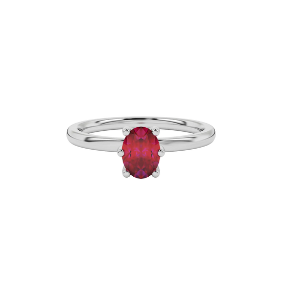 Close-up oval cut raspberry red gemstone ring, white gold six prong setting.