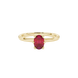 Close-up, oval cut raspberry red gemstone, yellow gold six prong ring.