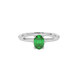 Close-up oval cut emerald green gemstone ring, white gold six prong setting.