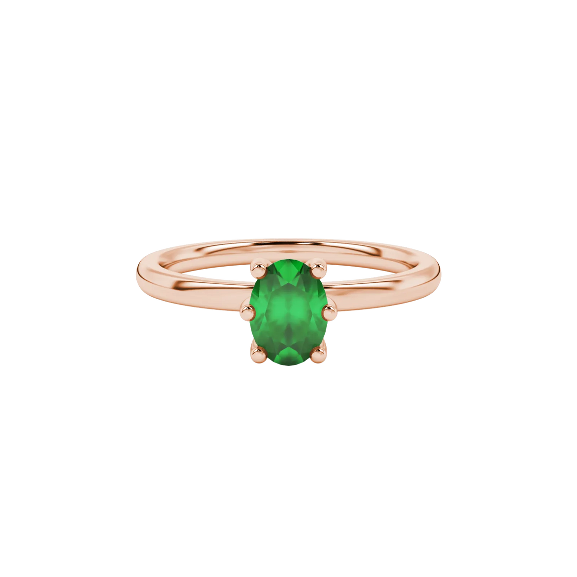 Close-up, oval cut emerald green gemstone ring, rose gold six prong setting.