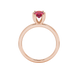 Oval cut raspberry red gemstone ring, rose gold six prong setting.