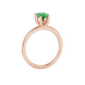 Side profile, rose gold emerald green ring, six prong gallery.