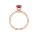 Oval cut raspberry red gemstone ring, rose gold classic basket setting.