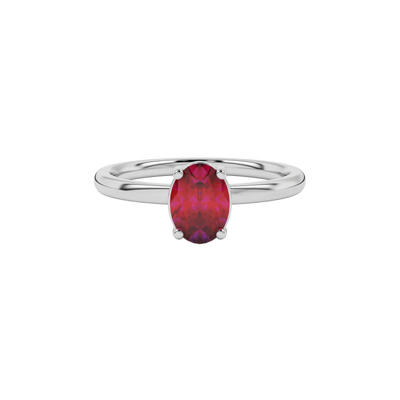 Close-up oval cut raspberry red gemstone ring, white gold classic basket.