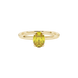 Close-up, oval cut canary yellow gemstone, yellow gold classic basket ring.