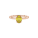 Close-up, oval cut canary yellow gemstone ring, rose gold classic basket.